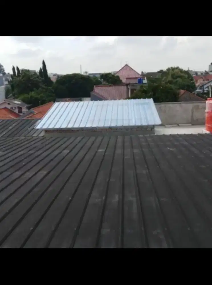 Baja ringan atap spandek pasir terpasang