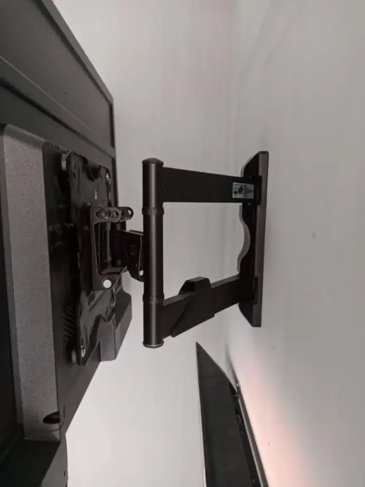 Pasang bracket tv led lcd di dinding plat tebal