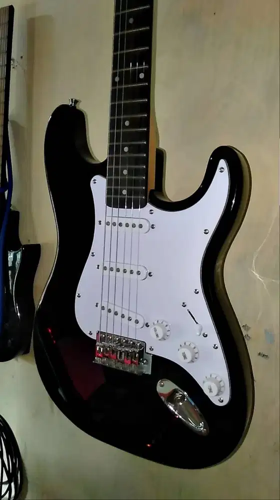 Gitar listrik setengah harga