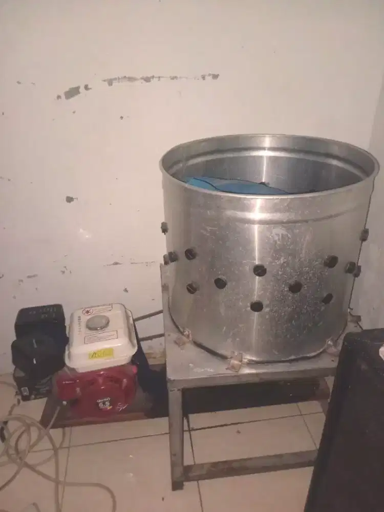 Mesin cabut bulu ayam.