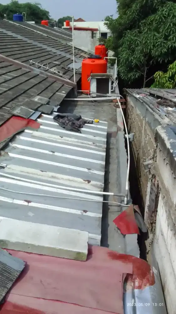 Tukang perbaikan atap bocor dinding dak rembes talang air renovasi DLL