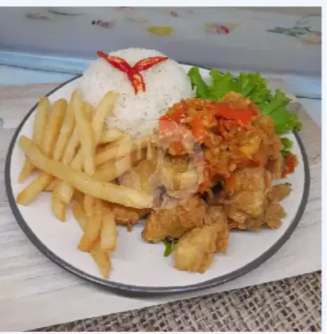 KARYAWAN DI RUMAH MAKAN