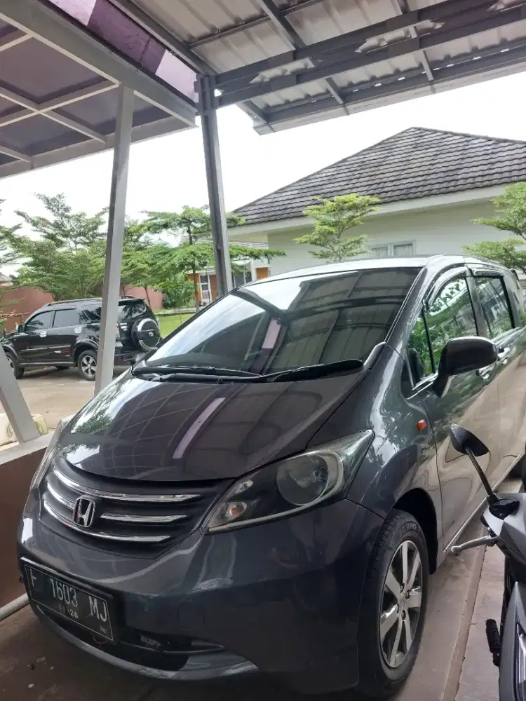 Honda freed e psd 2010