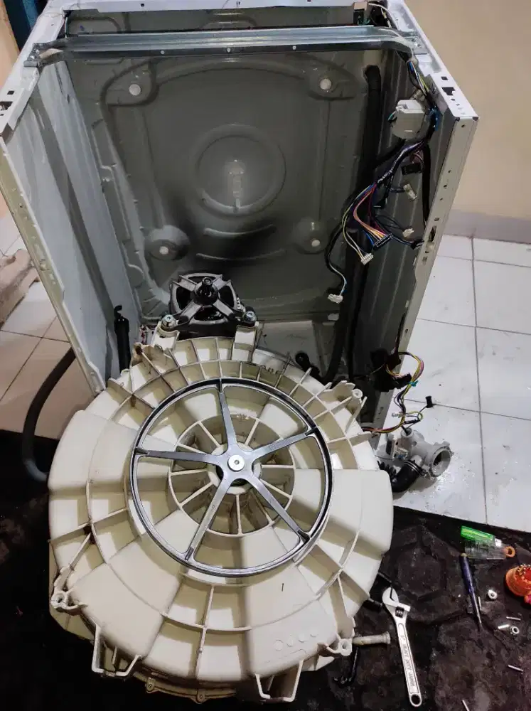 SERVIS MESIN CUCI FRONT LODING