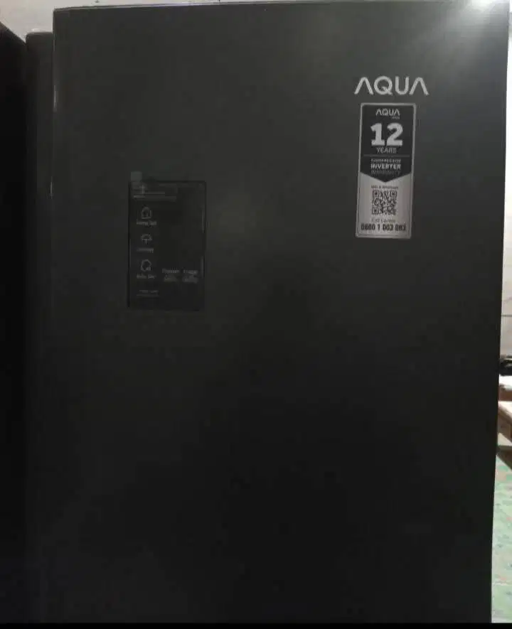 Kulkas merek Aqua pemakaian belum setahun