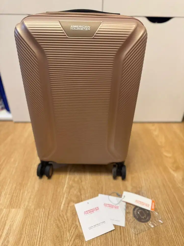 Koper American Tourister Robotech warna Gold size Medium (cabin)