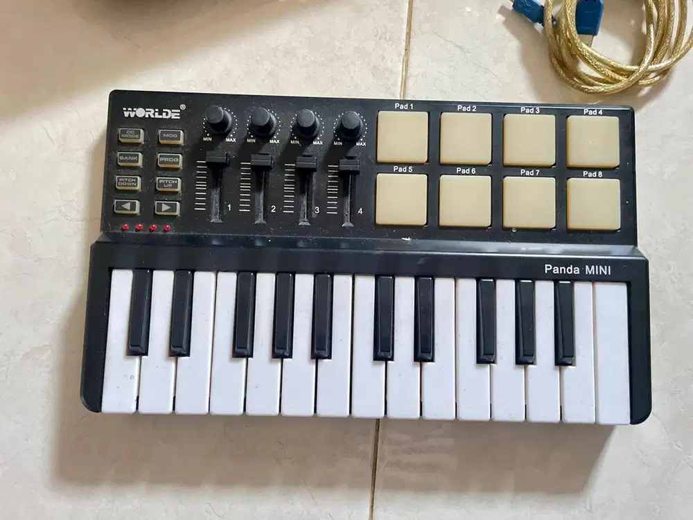 Midi Controller Worlde Panda Mini 25-Key USB Keyboard And Drumpad