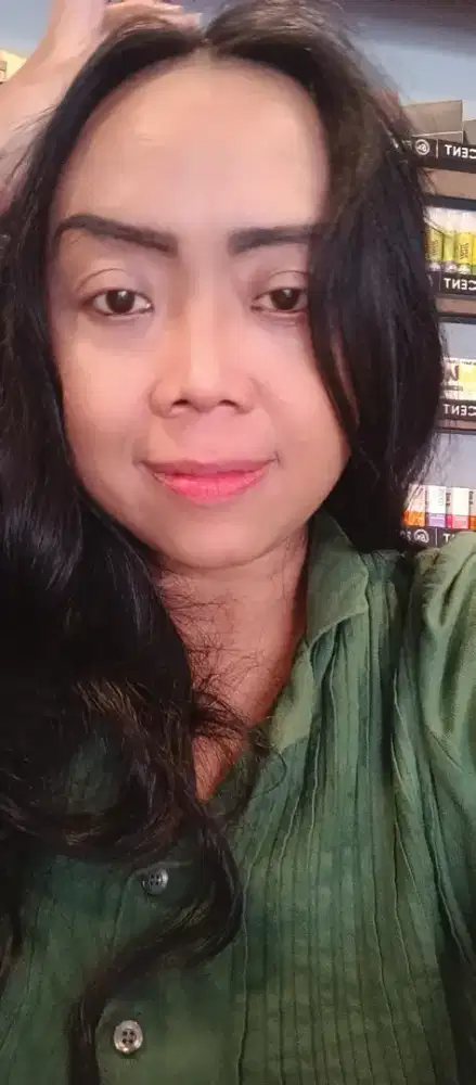 Pramuniaga /penjaga toko