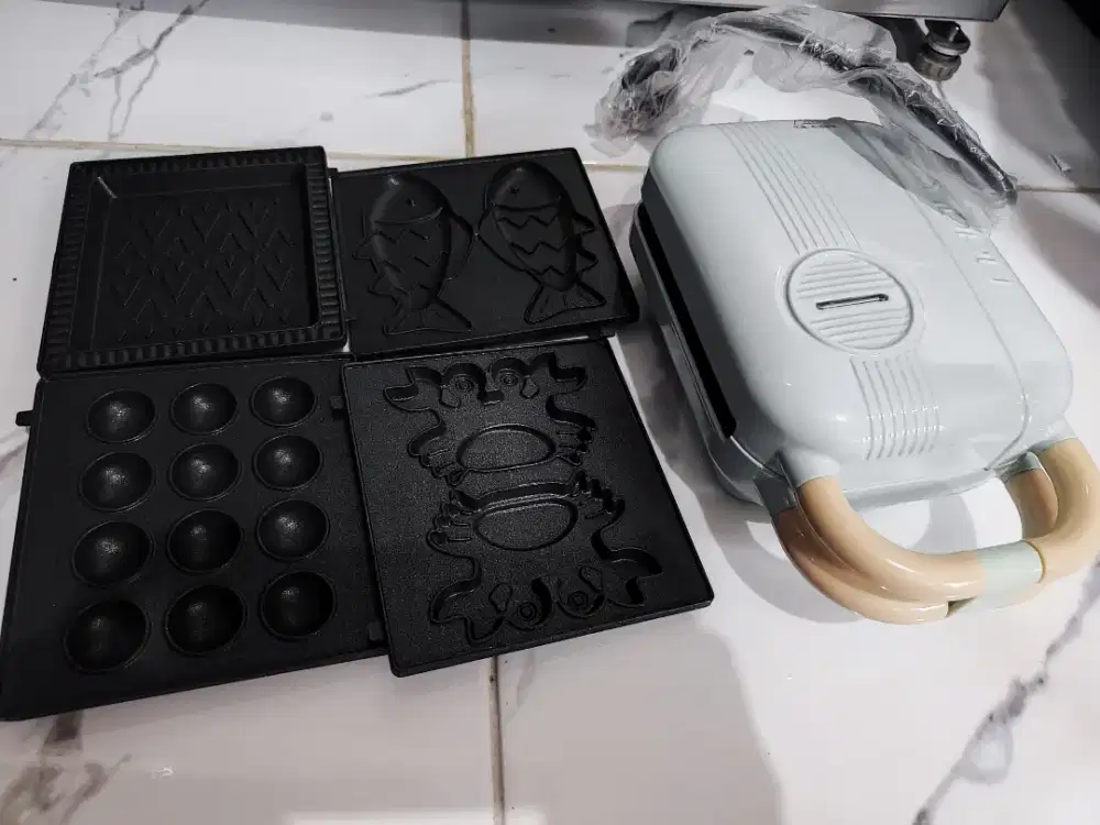 Cetakan kue semacam dorayaki