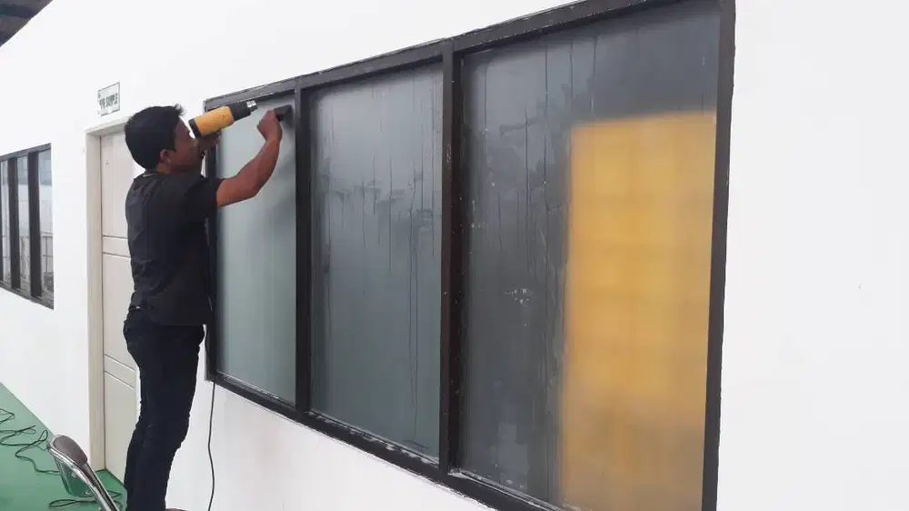 PUSAT KACA FILM RUMAH DAN GEDUNG