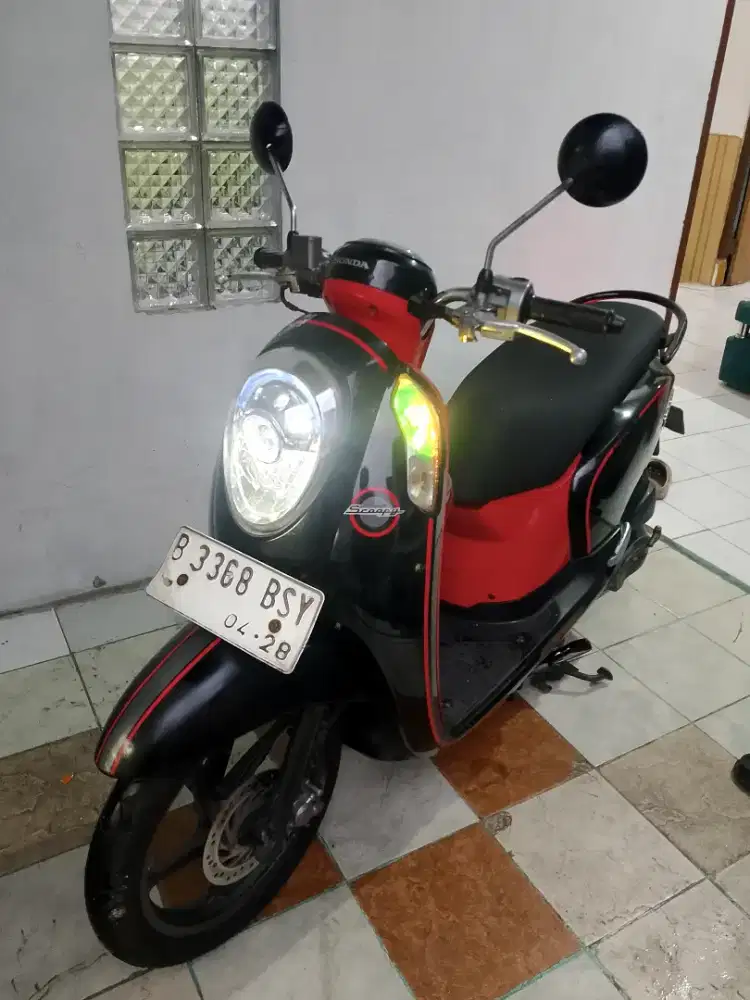 Scoopy fi injeksien tahun 2013