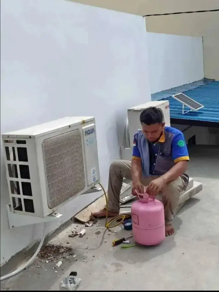 SERVIS AC BONGKAR PASANG AC DLL