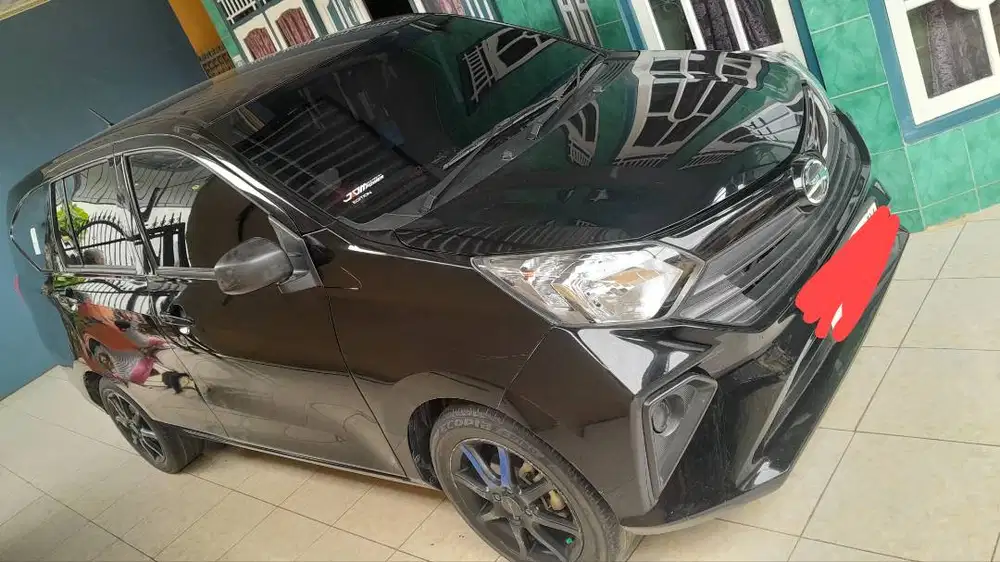 Over kredit mobil sigra tahun 2023