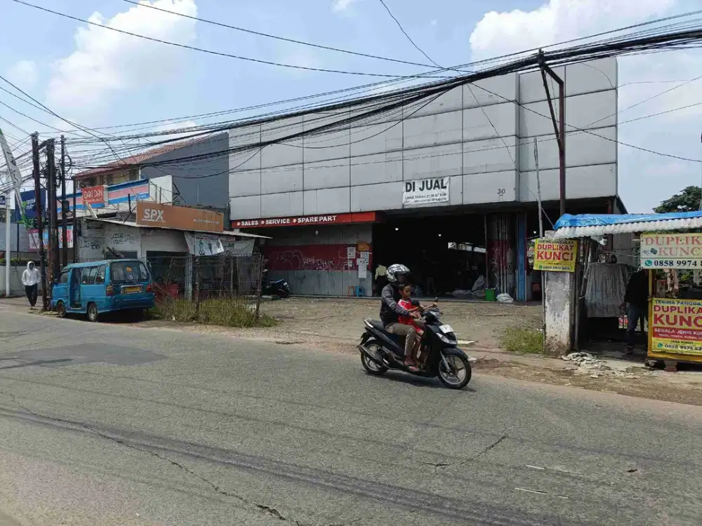 DIJUAL CEPAT TANAH LUAS 2150M2 BONUS BANGUNAN SHOWROOM DI BEJI