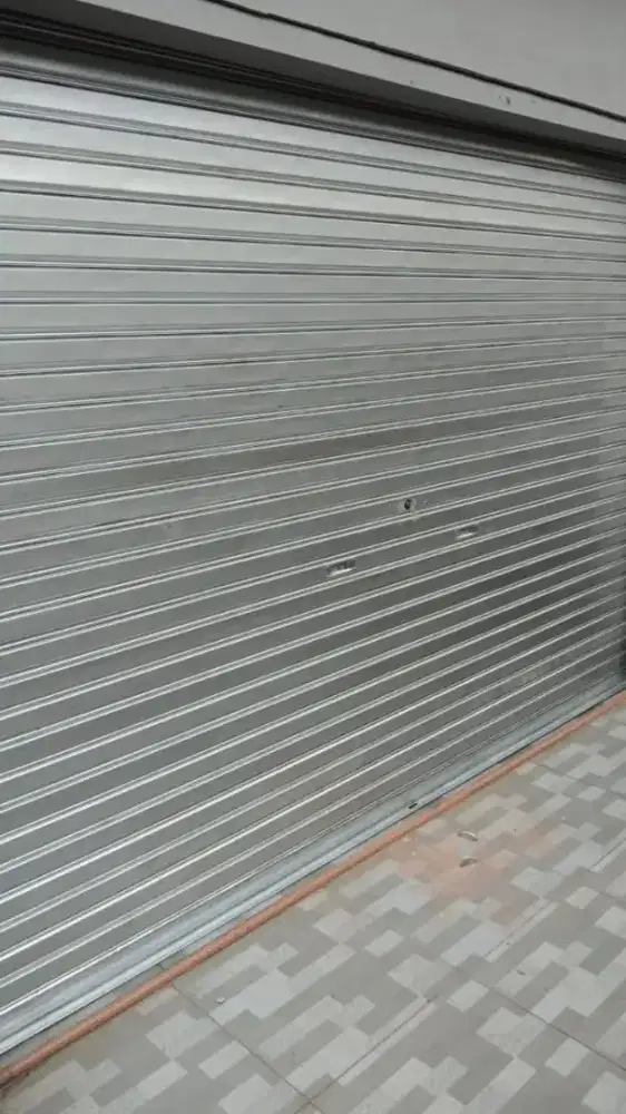 Pintu folding gate rolling door