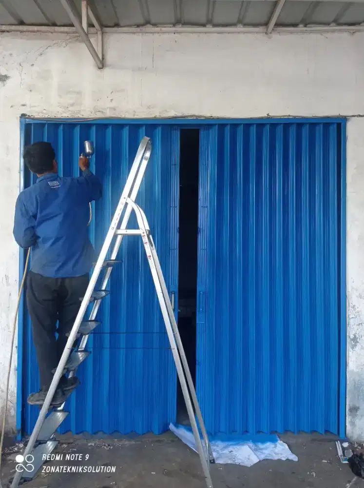 Pintu folding gate rolling door