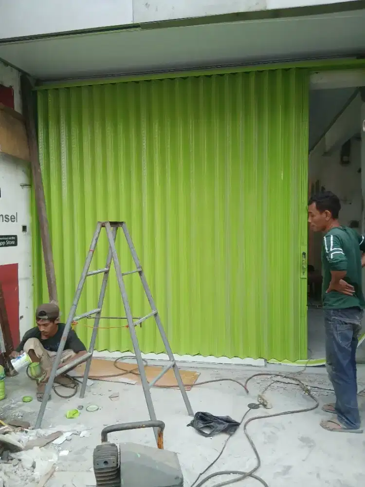 Pintu folding gate rolling door