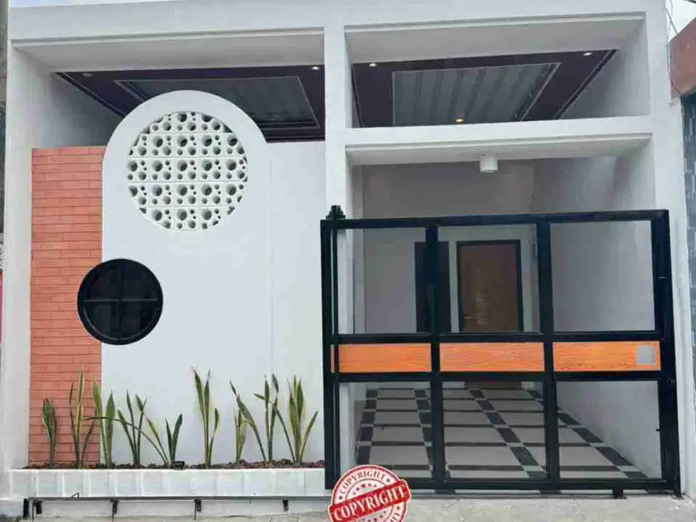 RUMAH CANTIK SIAP HUNI DITAMBUN SELATAN DEKAT STASIUN