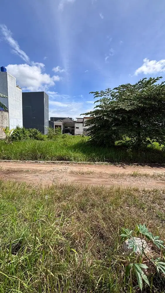 Tanah komarudin pinggil jalan