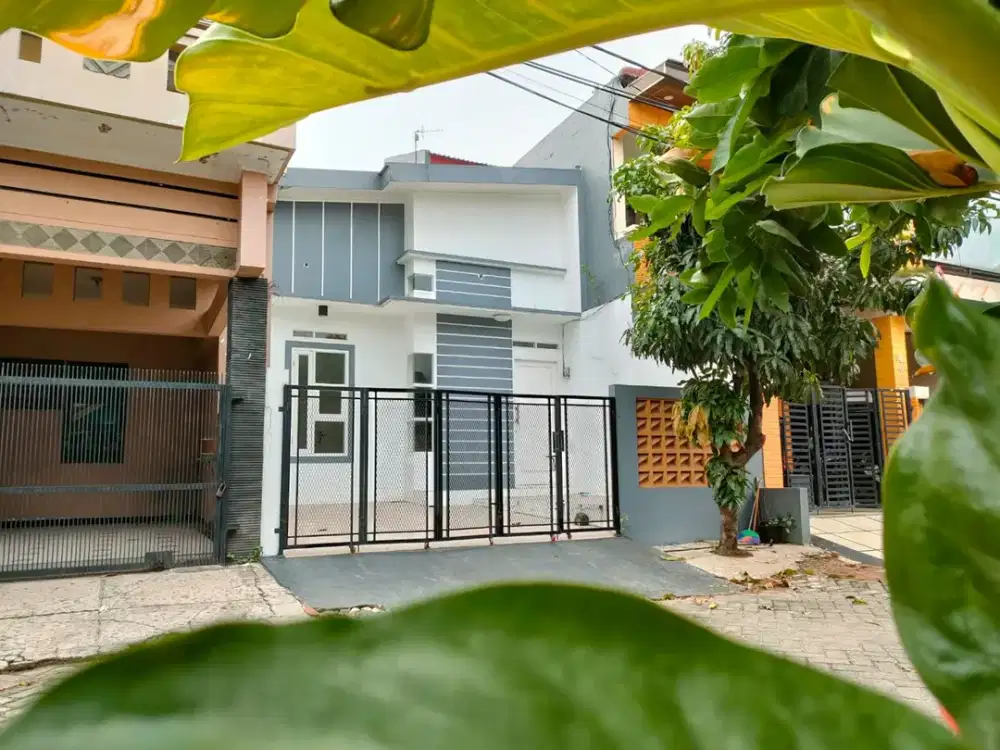 DI JUAL RUMAH MEZZANINE MODERN DENGAN CARPORT LUAS DI GRAHA HARAPAN BUMYAGARA