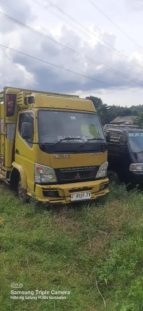 Truk bak kayu 125 ps