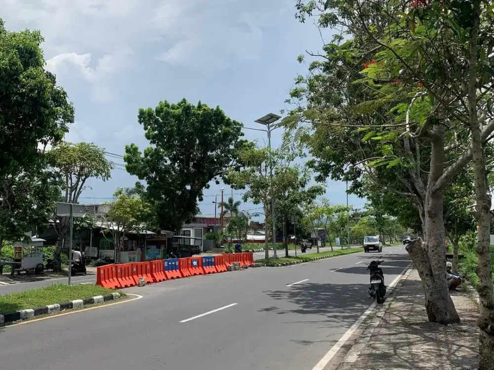 Tanah pinggir jalan lingkar selatan dekat sunsetland
