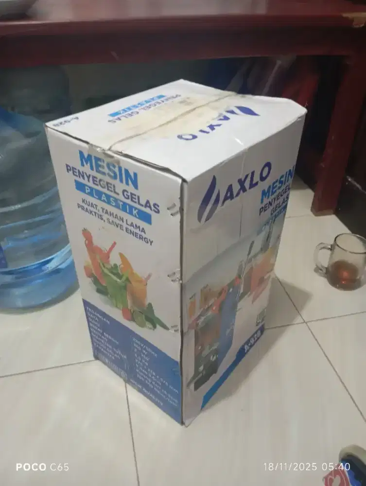 Mesin penyegel gelas