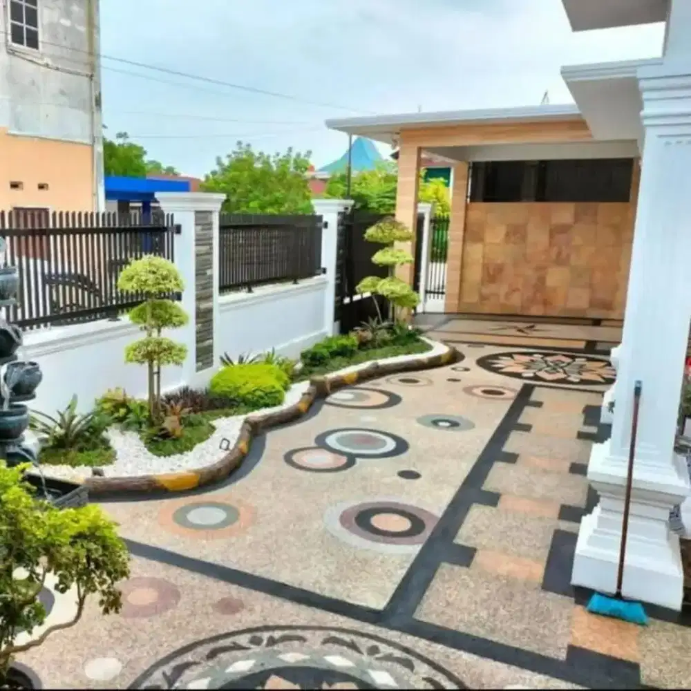 PEMASANGAN BATU KORAL SIKAT