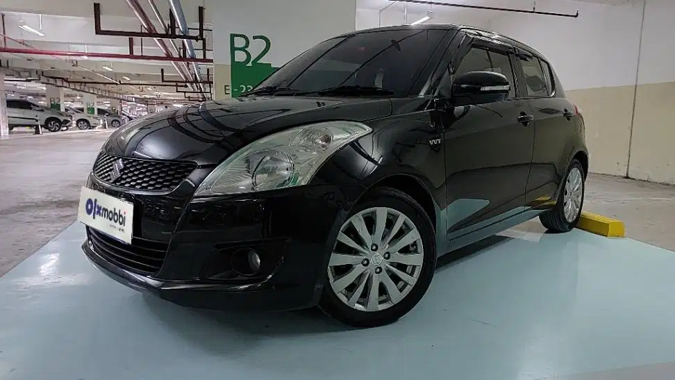 TDP 5,JT Suzuki Swift 1.4 GX Bensin-AT Hitam 2013