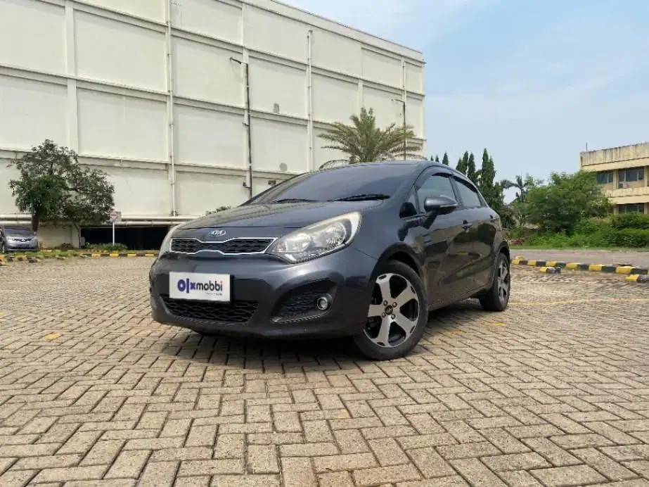 TDP 5,JT Kia Rio 1.4 Bensin-MT Abu-Abu 2014