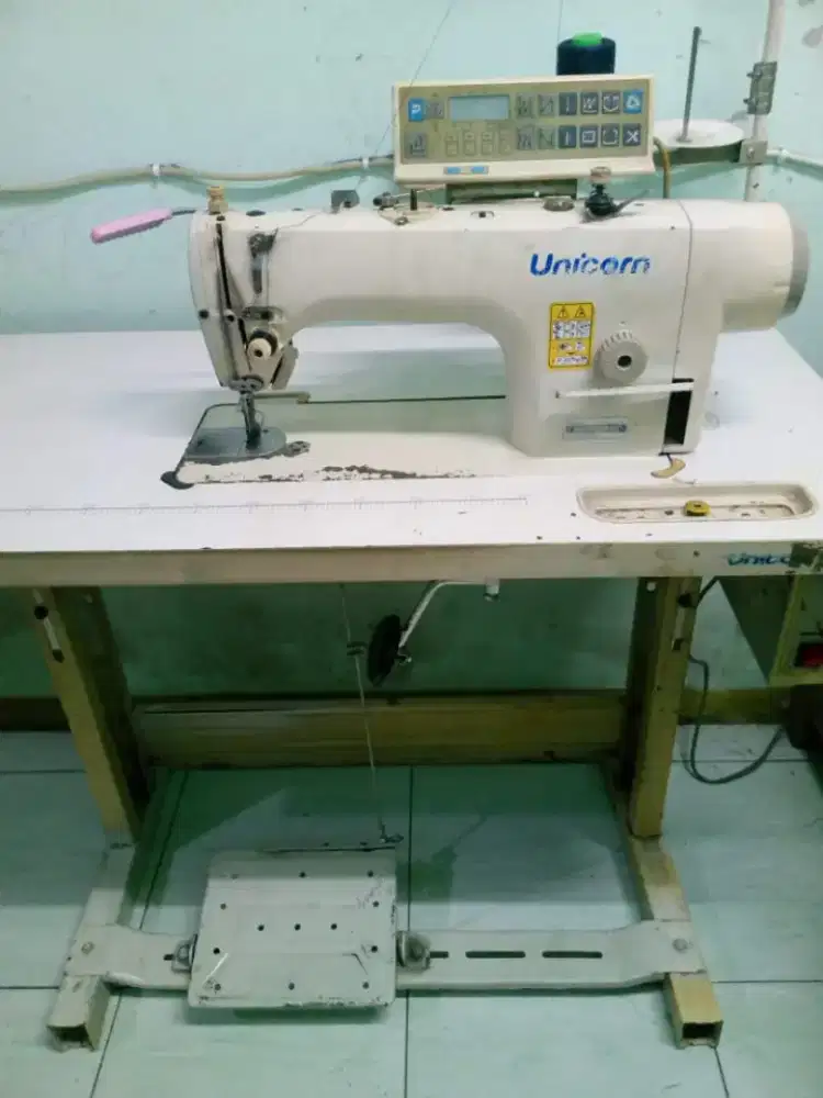 mesin jahit otomatis