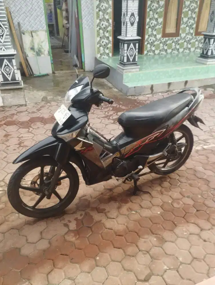 Supra x 125 Fi THN 2009
