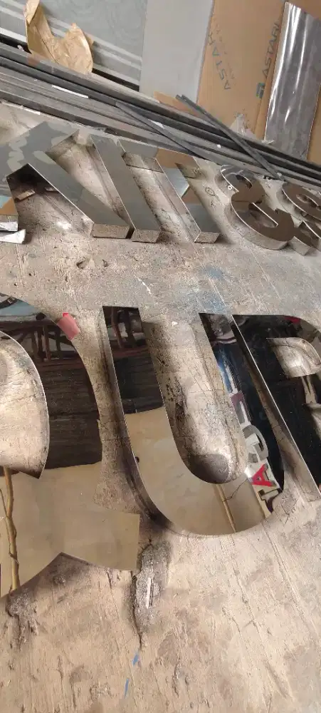 Huruf timbul stainless