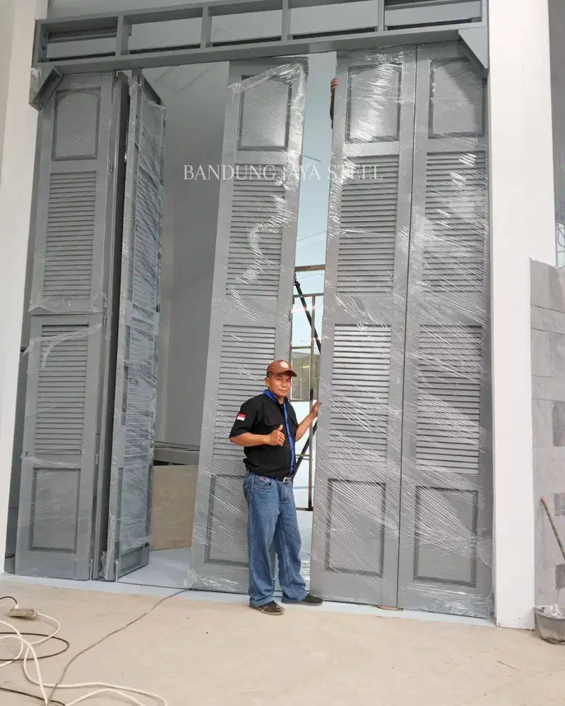 Melayani Pasang pintu besi garasi, sekat ruangan, gerbang ruko dll