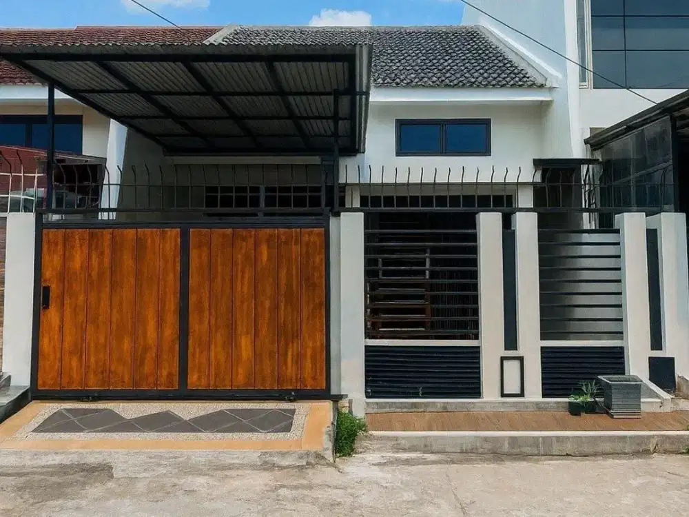 Rumah Babatan Pantai Strategis Siap Huni Carport