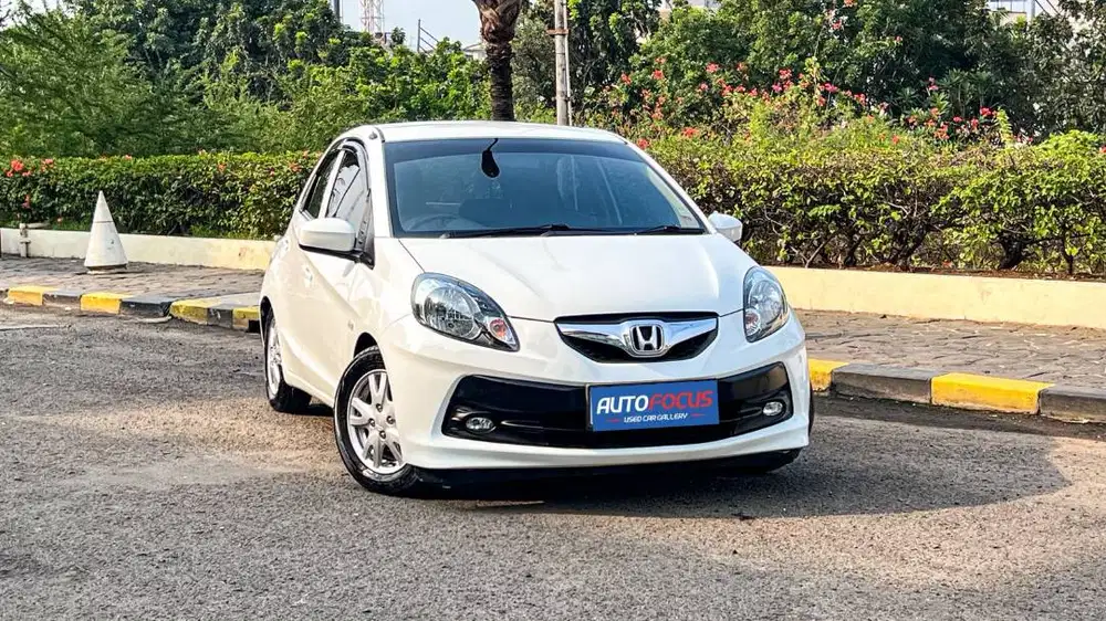 KM78Rb Honda Brio 1.2 E manual nik 2014 putih metalik