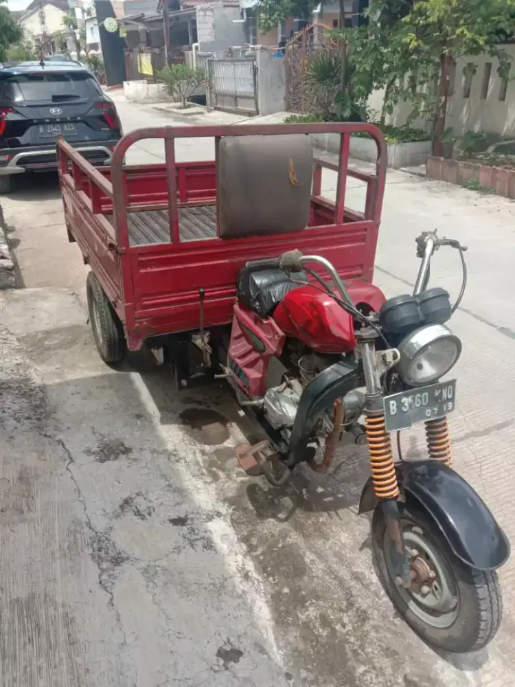 Motor roda tiga tahun 2013