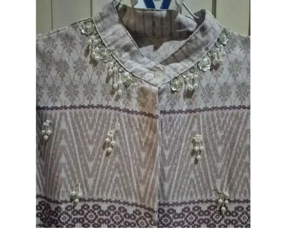 Dress ungu dengan corak