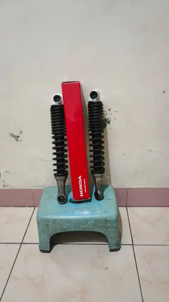 shock belakang supra x 125