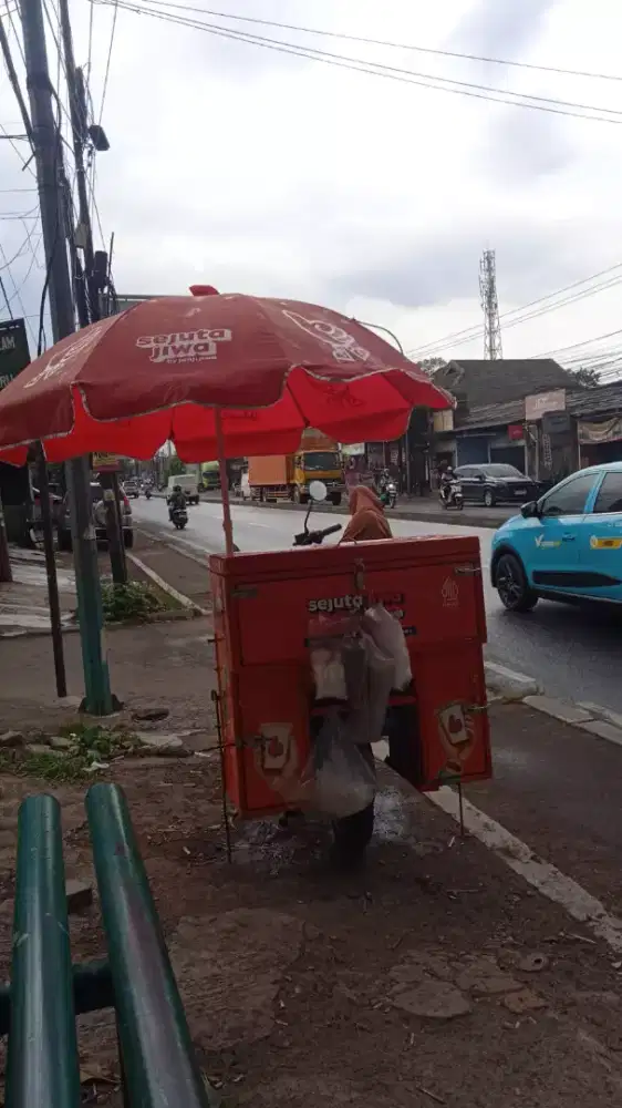 Payung dagang warna merah