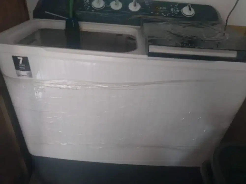 Mesin cuci merk aqua