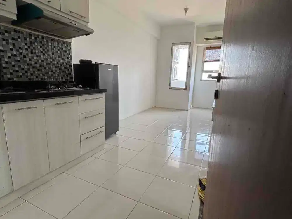 sewa apartemen puncak Kertajaya 2br semi furnish