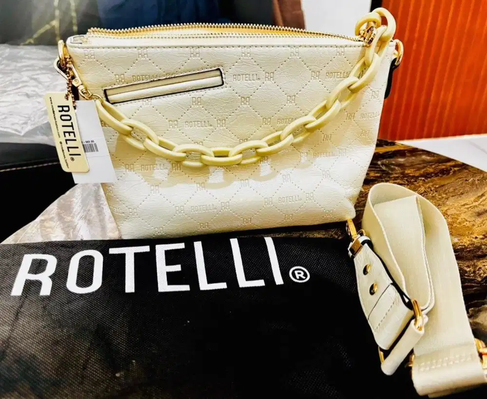 Tas rotelli warna cream