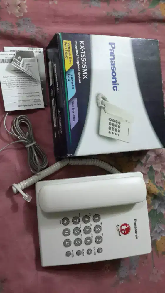Telepon rumah masih baru 150