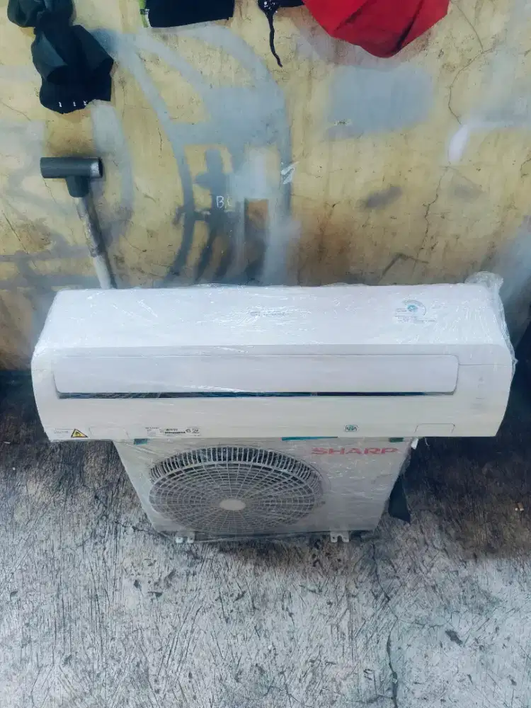 Jual AC merek sharp 1/2pk AC dingin mantap