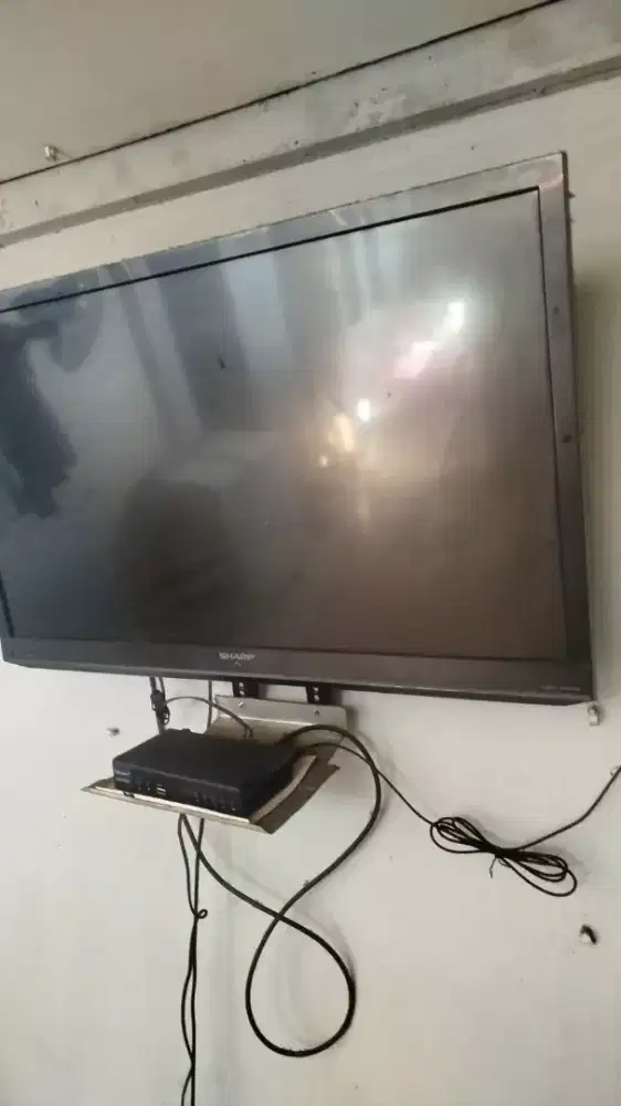 TV sharp 32inc no minus masih nyala Dan belum pernah diservice