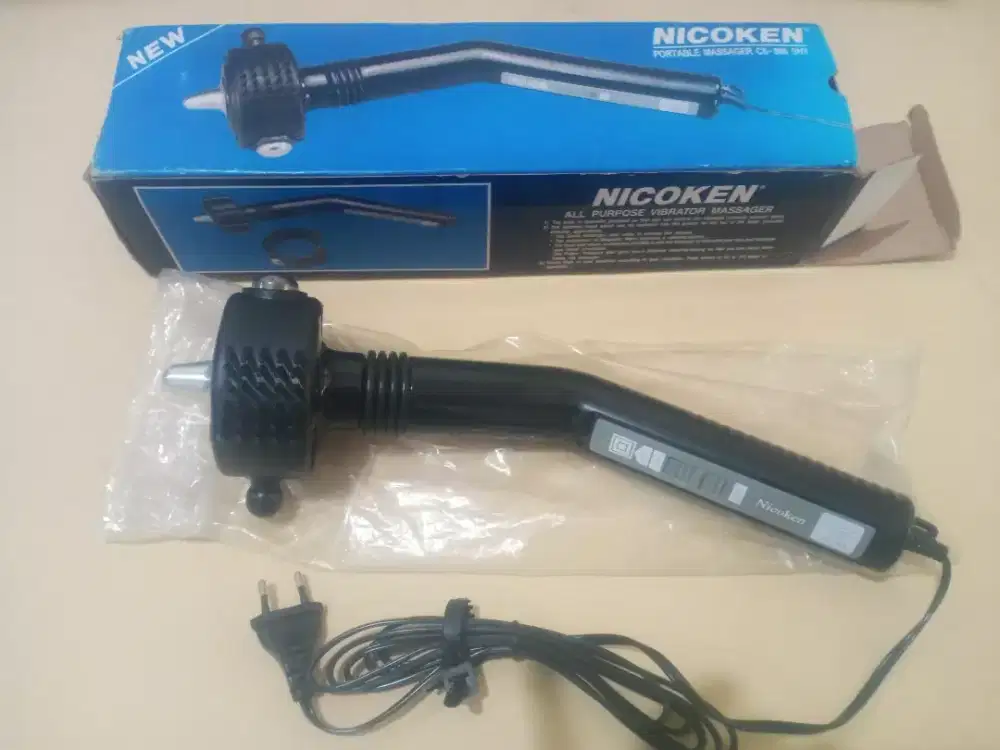 Alat pijat dan terapi kesehatan NICOKEN kondisi baru.