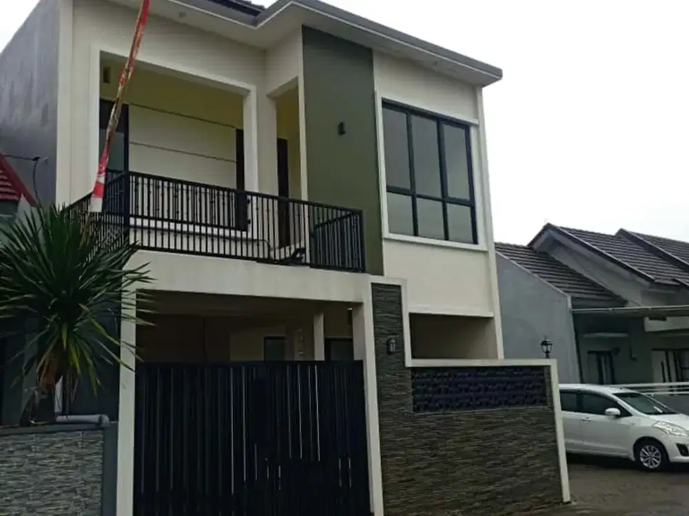 Rumah Malang desain modern akses mobil Dekat Bandara