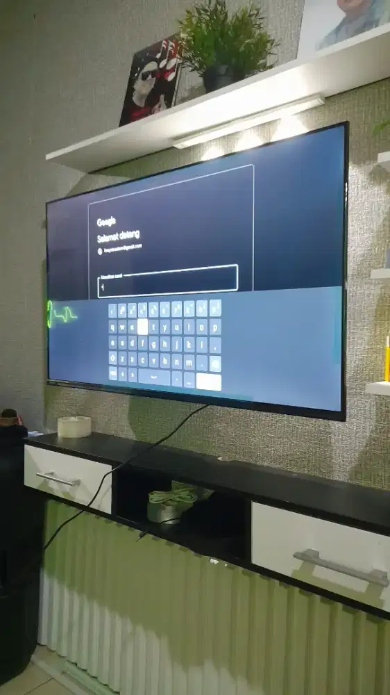 Pasang bracket tv led lcd di dinding