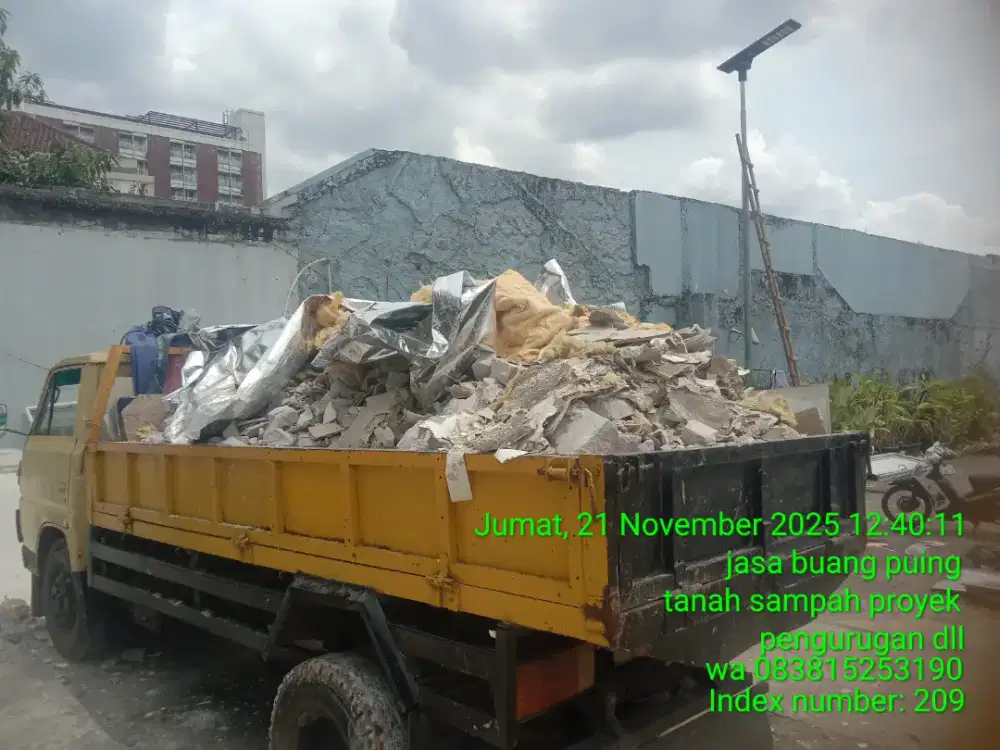 Tukang buang puing sampah dll